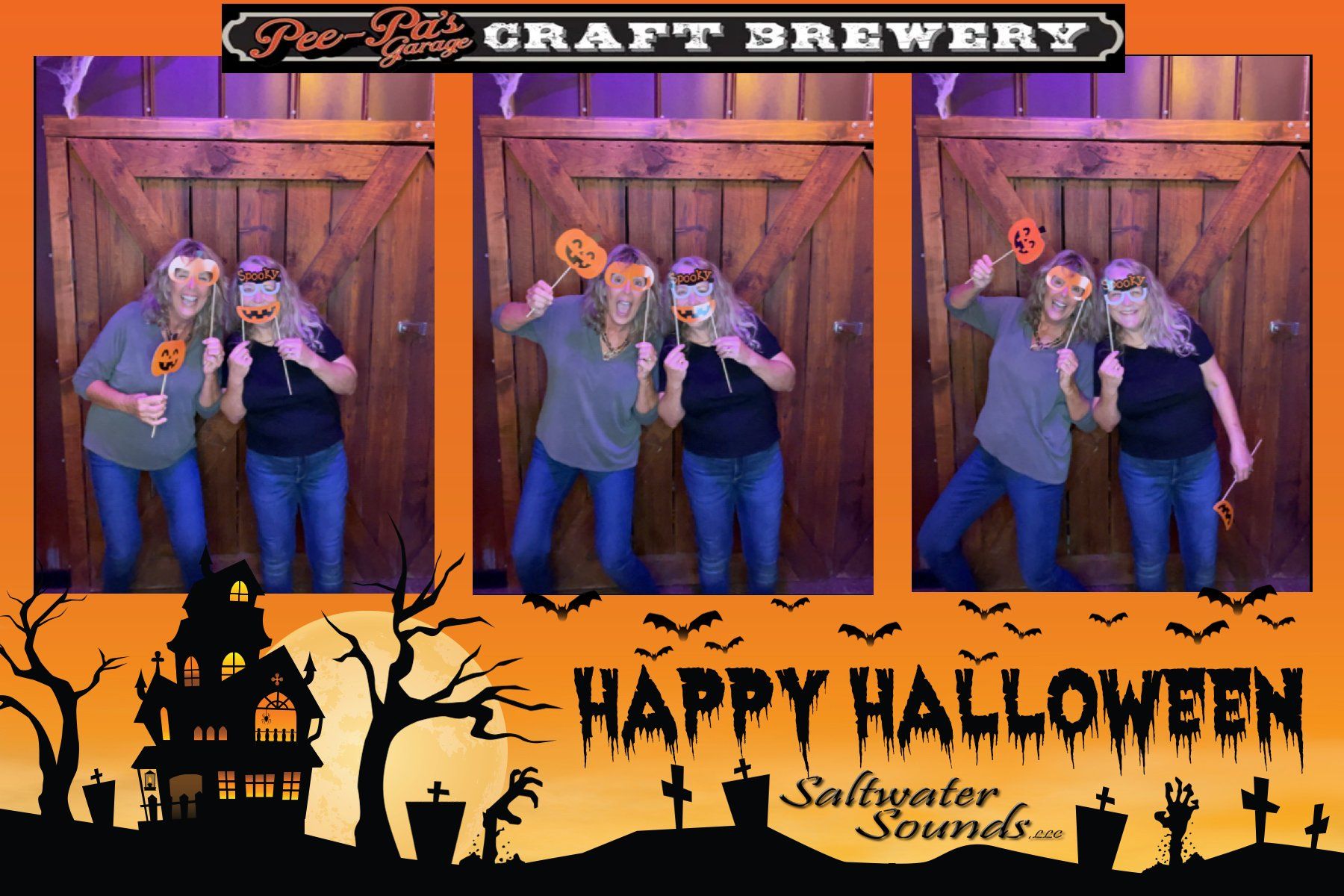 A photo booth says happy halloween on it