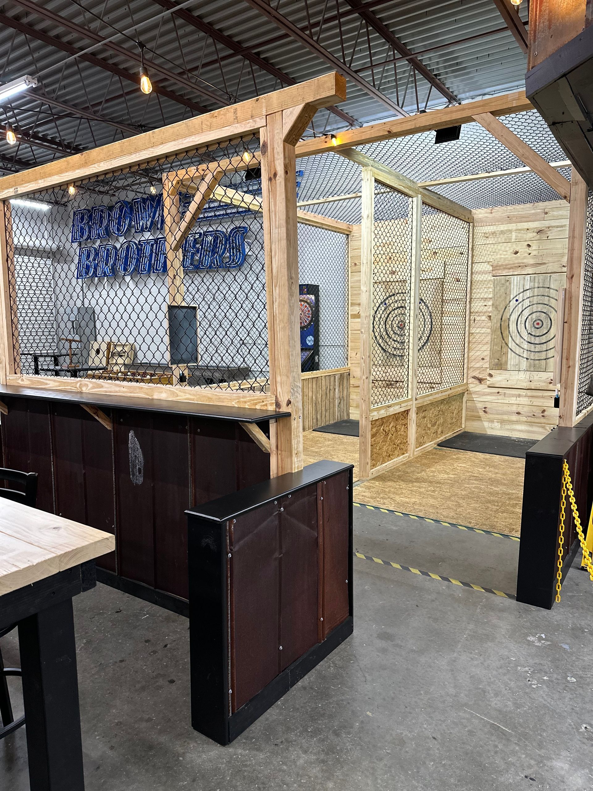 There is a wooden structure in the middle of the room.