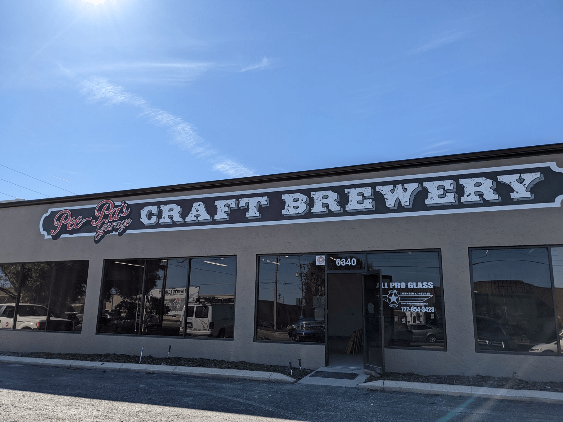 A building with a sign that says craft brewery on it