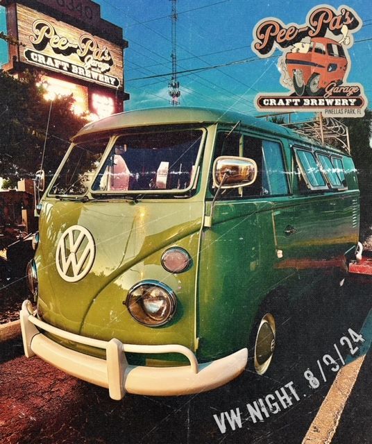 A green vw van is parked in front of a craft brewery