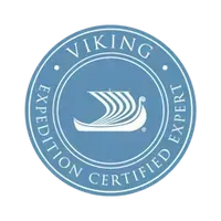 Blue circular badge with white text and a white Viking ship design. The text reads "VIKING EXPEDITION CERTIFIED EXPERT."