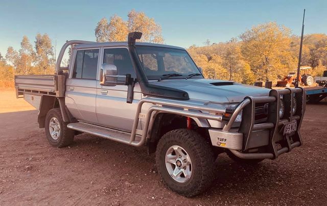 Silver, Four-door Pickup Truck With Bull Bar, Snorkel, and Tray Bed — Traction Diesel Services in Clermont, QLD