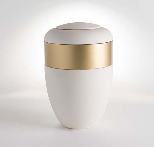 White urn with a gold band.