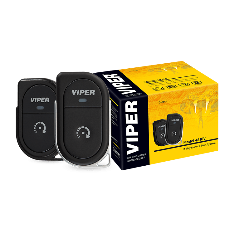 A pair of viper remote controls next to a box.