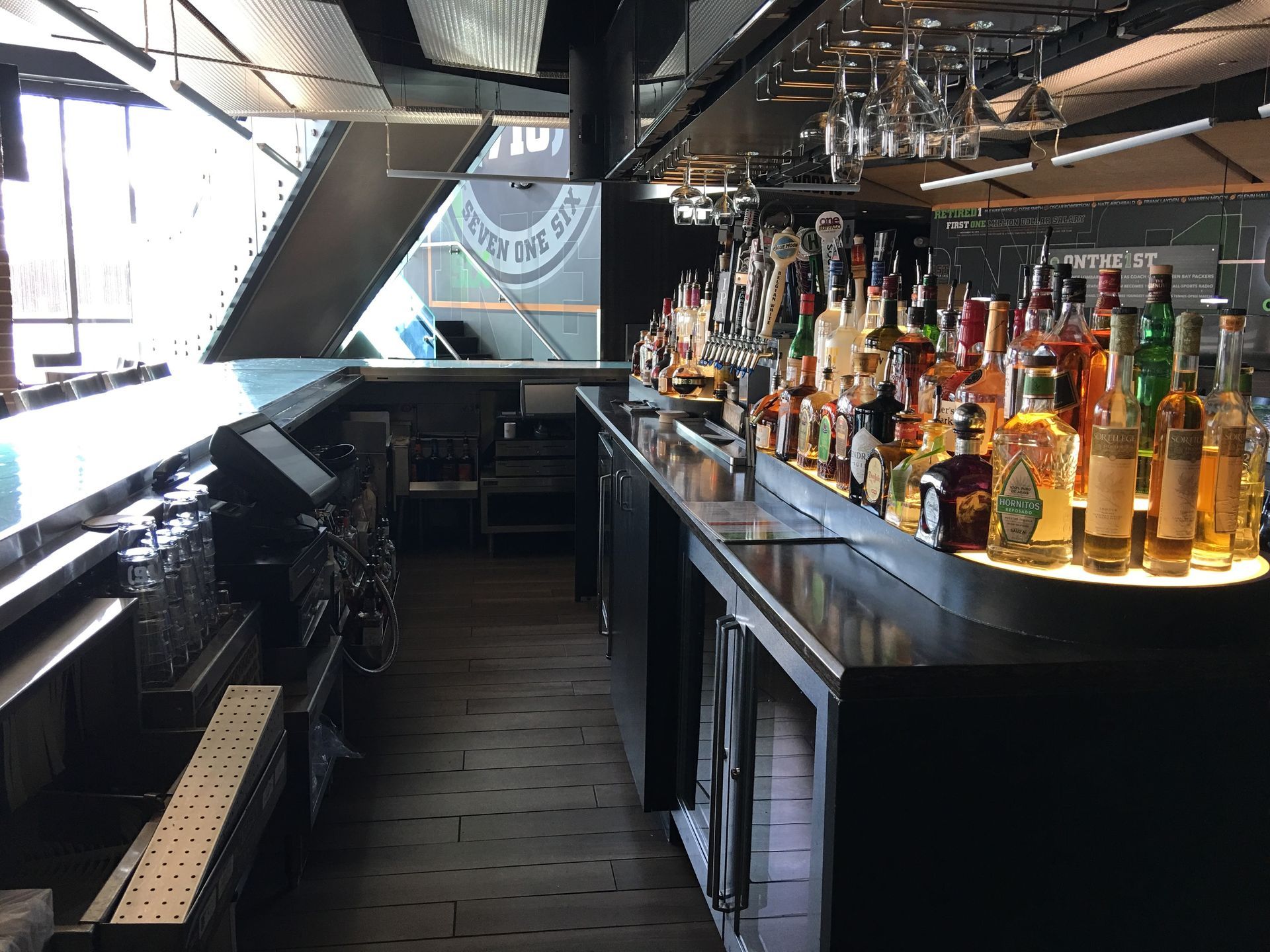 a bar with a sign that says seven one six