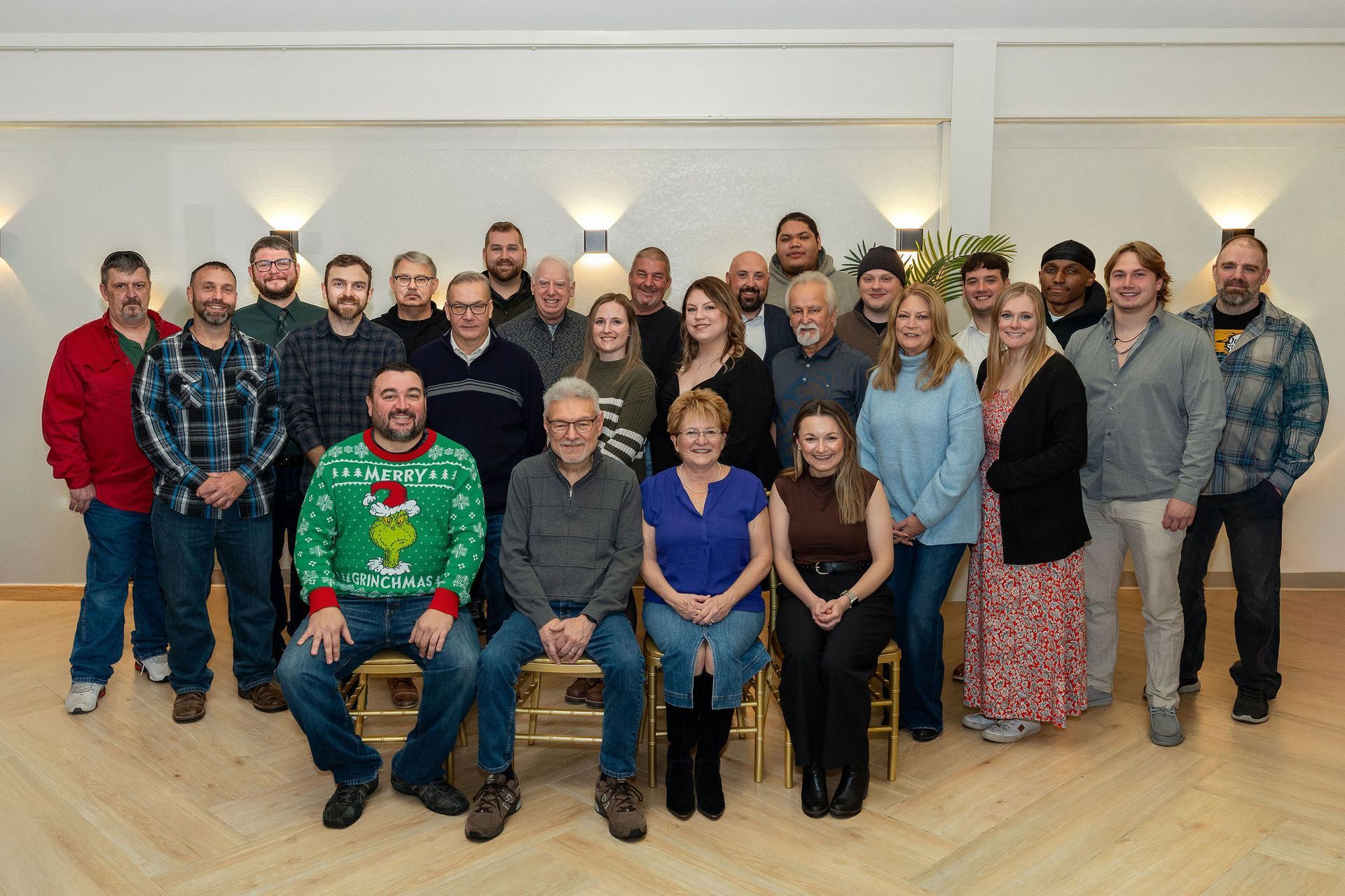 three people stand in front of a hearts food pantry