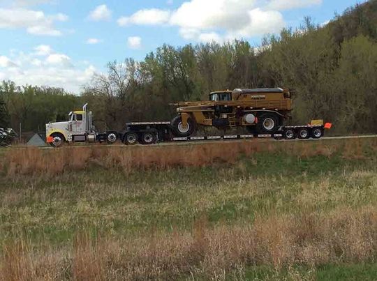 Construction equipment being hauled — Construction Equipment Transport in Mankato, MN
