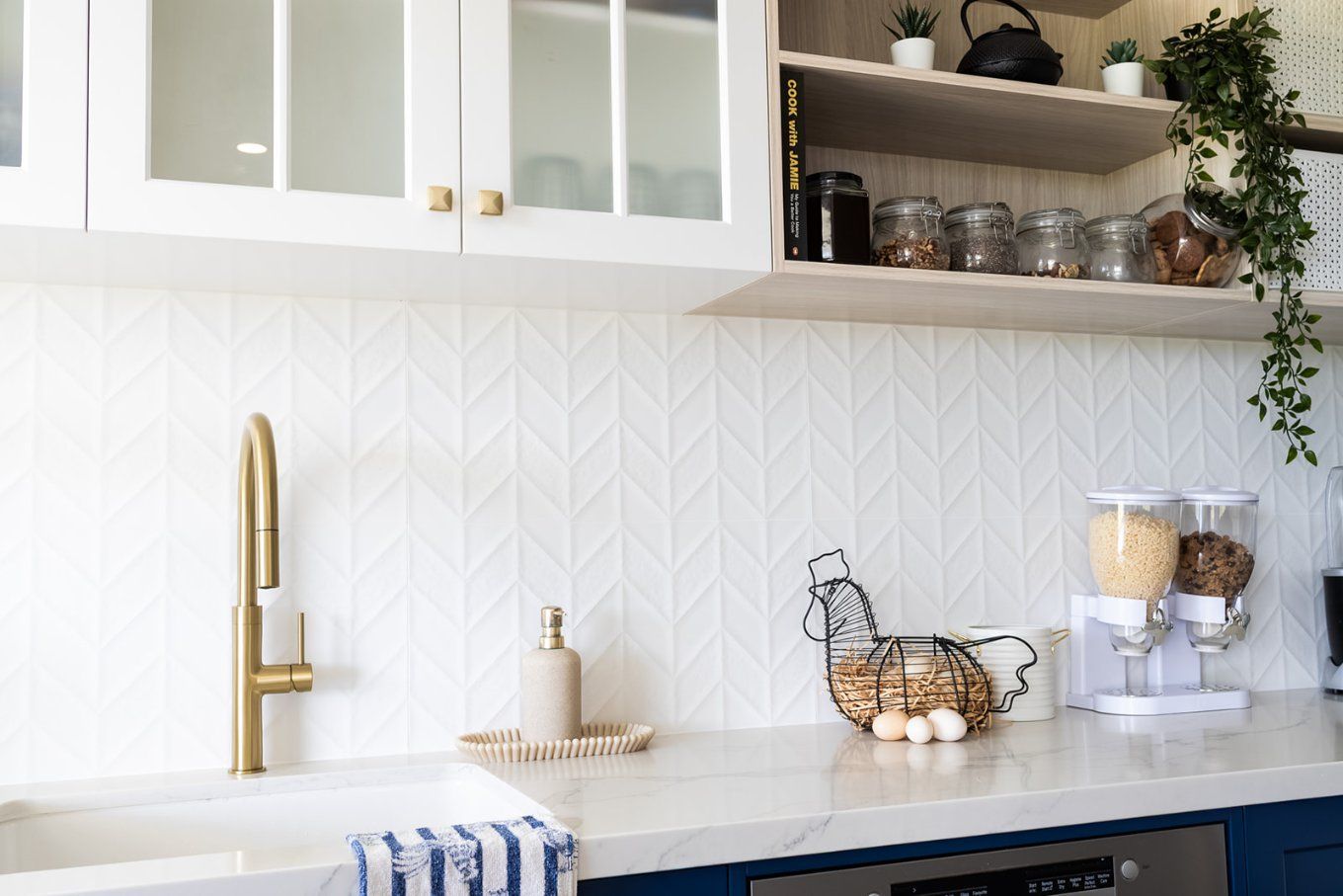 Modern Kitchen With White Cabinets, Gold Faucet, and White Tile Backsplash — Truline Cabinets In Tuchekoi, QLD