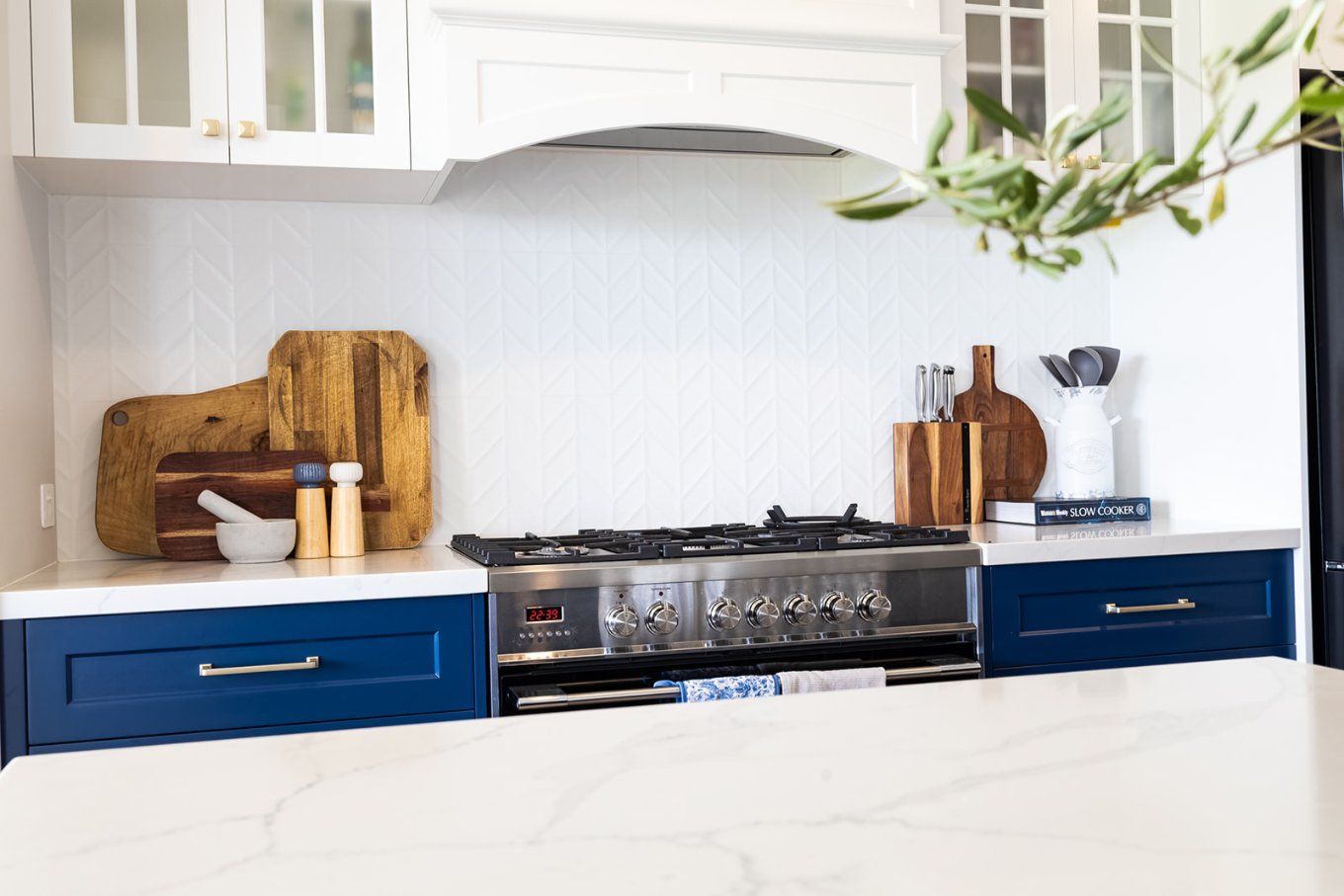 Kitchen With White Countertops, Blue Cabinets, and a Stainless Steel Stove — Truline Cabinets In Tuchekoi, QLD