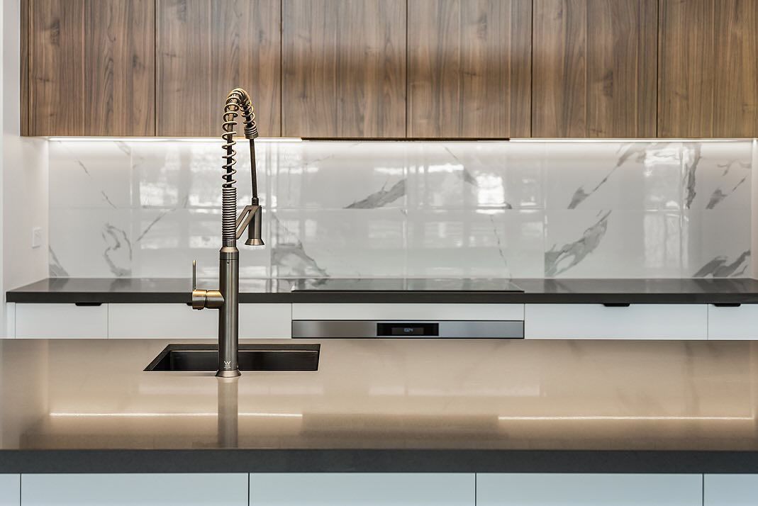 Modern Kitchen With a Stainless Steel Faucet, Wood Cabinets, and Marble Backsplash — Truline Cabinets In Tuchekoi, QLD