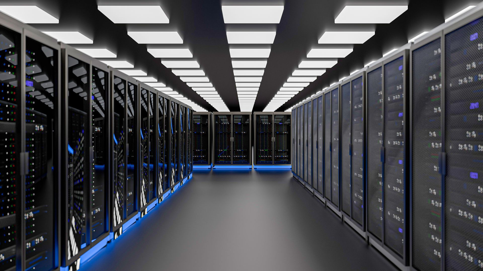 Long hyperscale data center aisle of racks with blue accent lighting