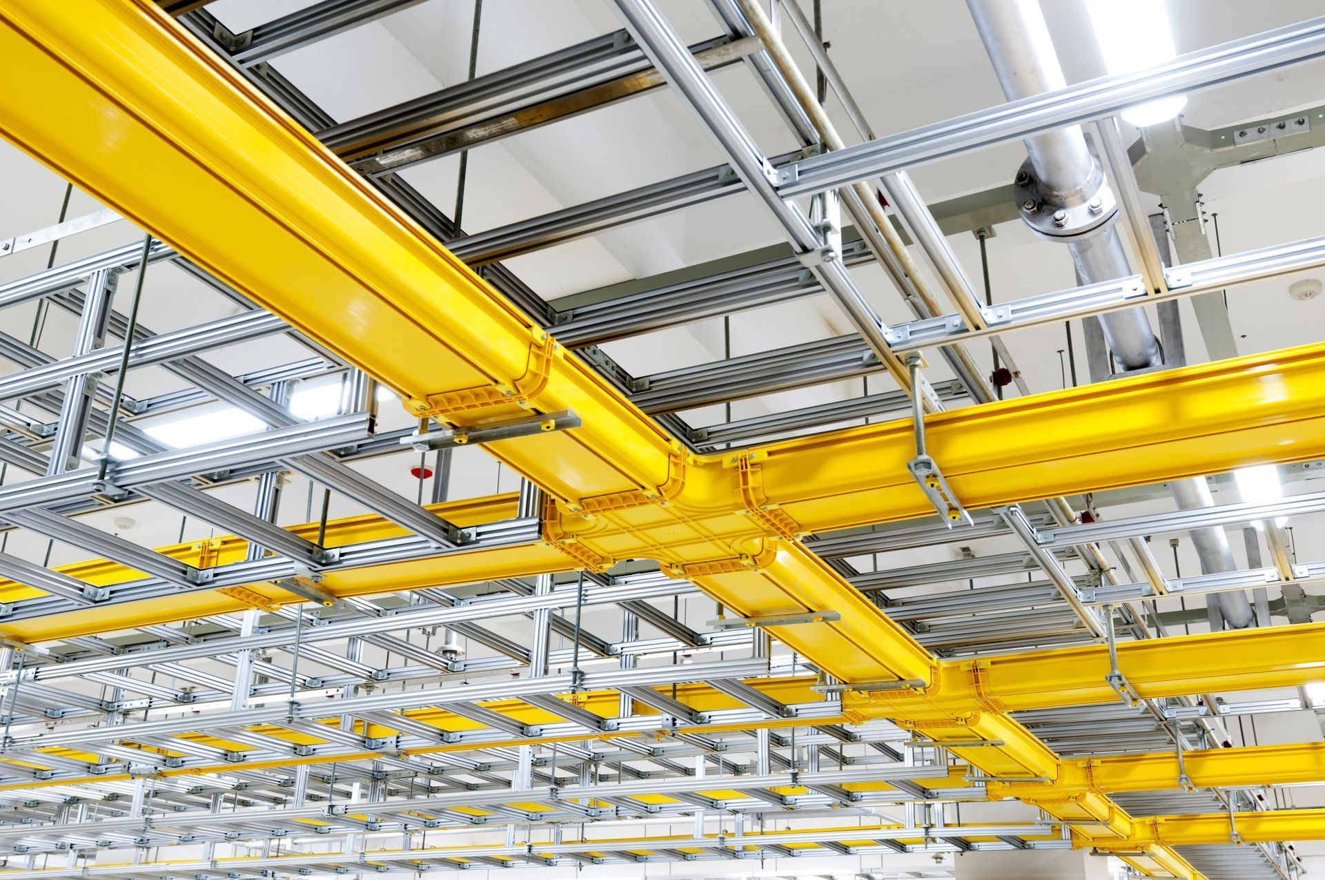 Overhead conveyance for telecommunications in a data center