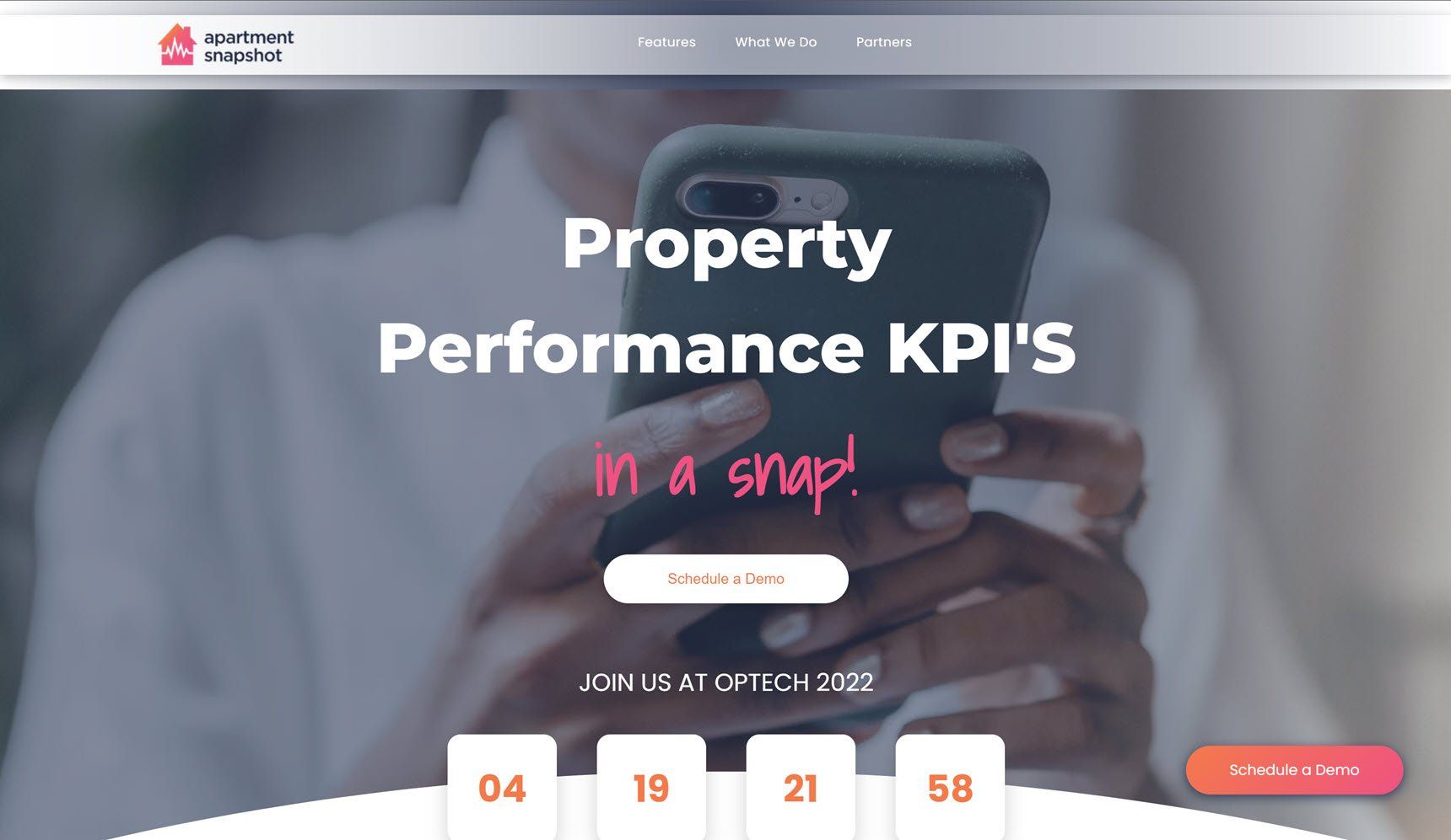 A person is holding a cell phone in their hand.