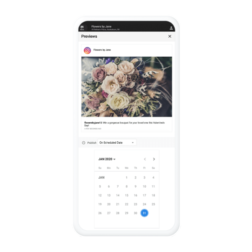 A cell phone with a calendar and a picture of flowers on it.
