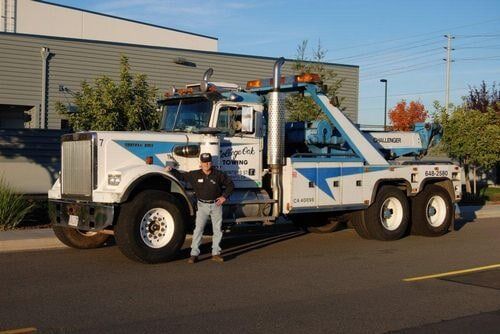 Tow Truck and Worker - emergency towing in Sacramento, CA