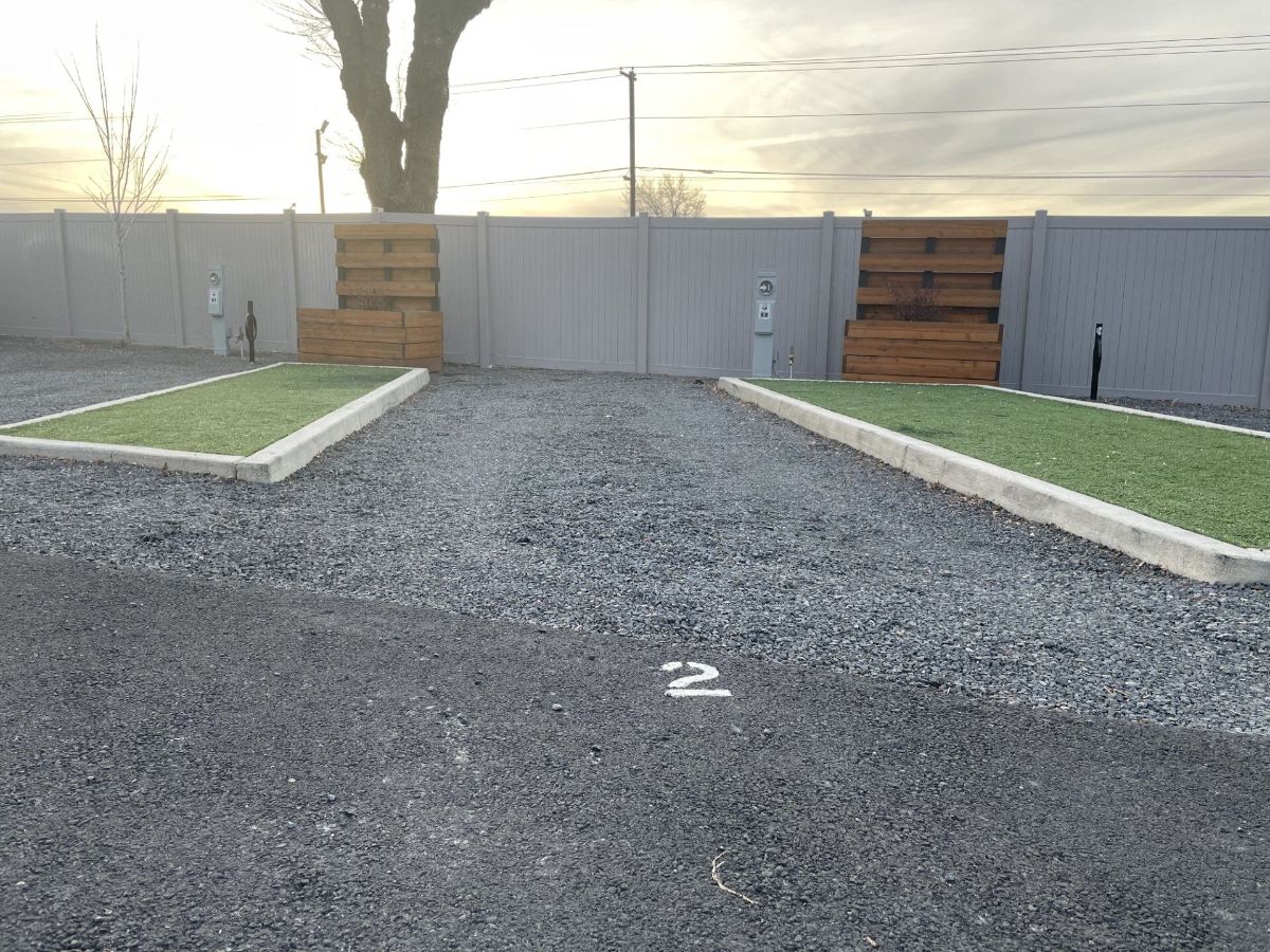 a parking lot with the number 2 painted on the ground