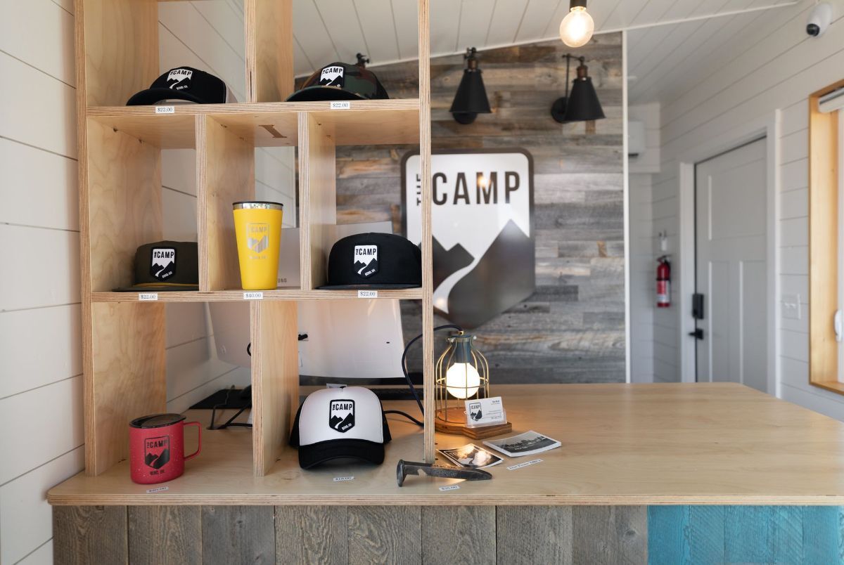 a counter with a sign that says camp on it .