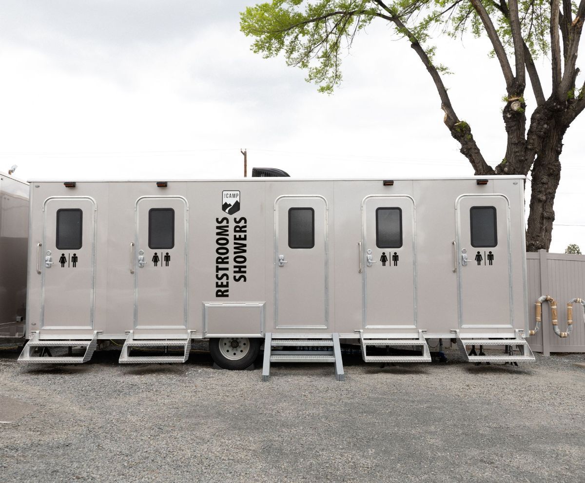 a trailer that says restrooms and showers on it