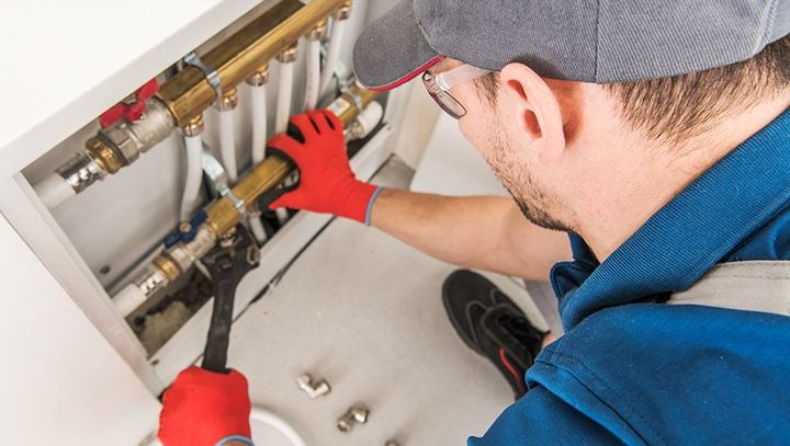 Plumbing expert fixing pipes lines