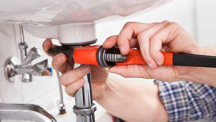 Plumber’s wrench used on fixing a sink