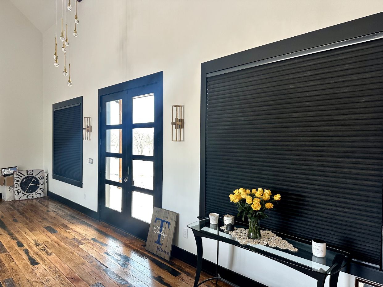 An attractive entry way has honeycomb shades on the windows - Window Fashions on Wheels, Louisville, KY