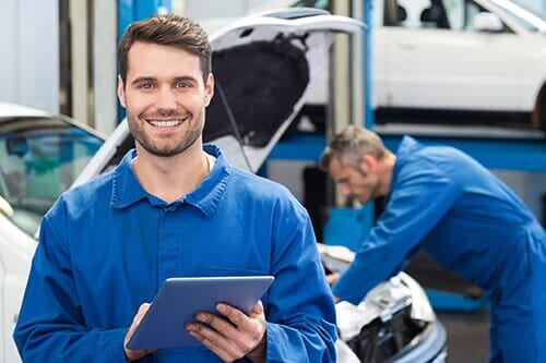Man in a mechanic workshop - vehicle service in Tampa, FL