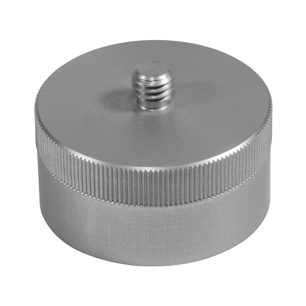 A stainless steel nut with a hole in the middle