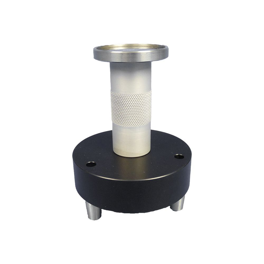 A person is holding a white ball in their hand