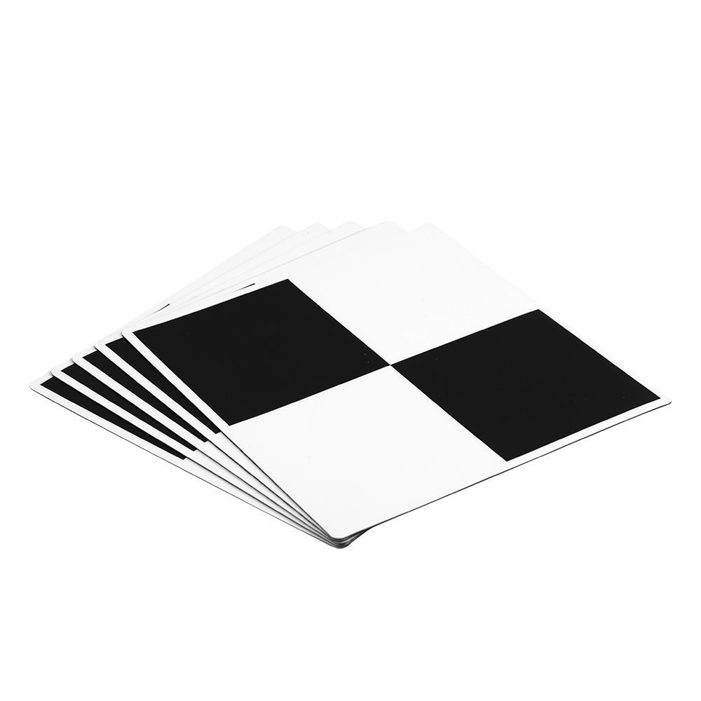 A black and white checkered pattern on a piece of paper