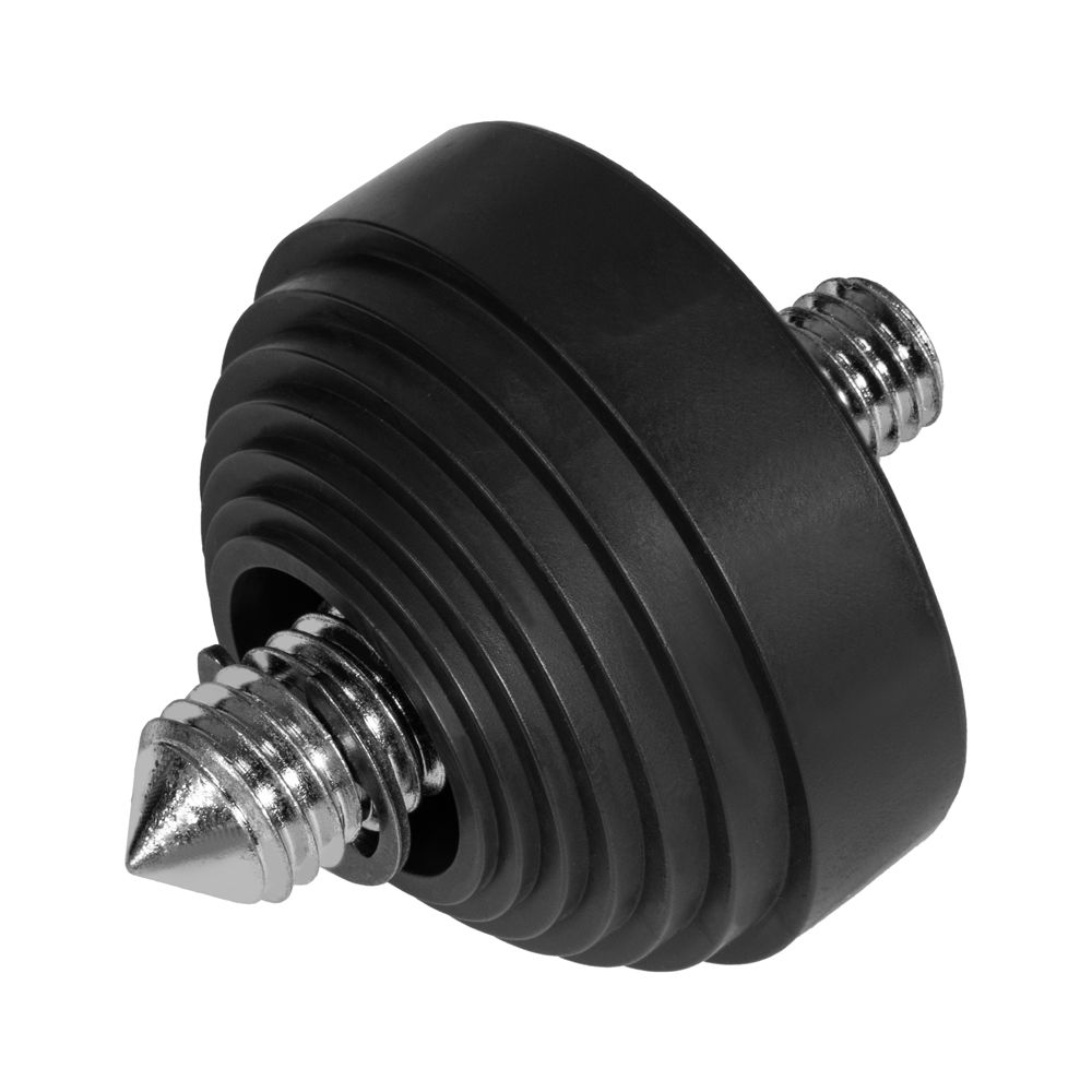 A close up of a metal nut and washer on a black object