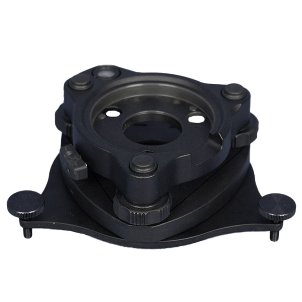 A close up of a black object on a white background