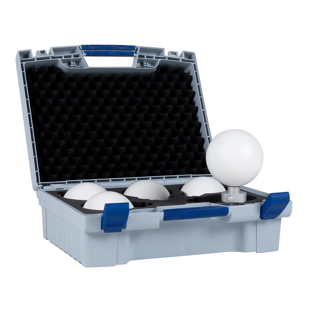 A white ball is sitting on top of a blue case