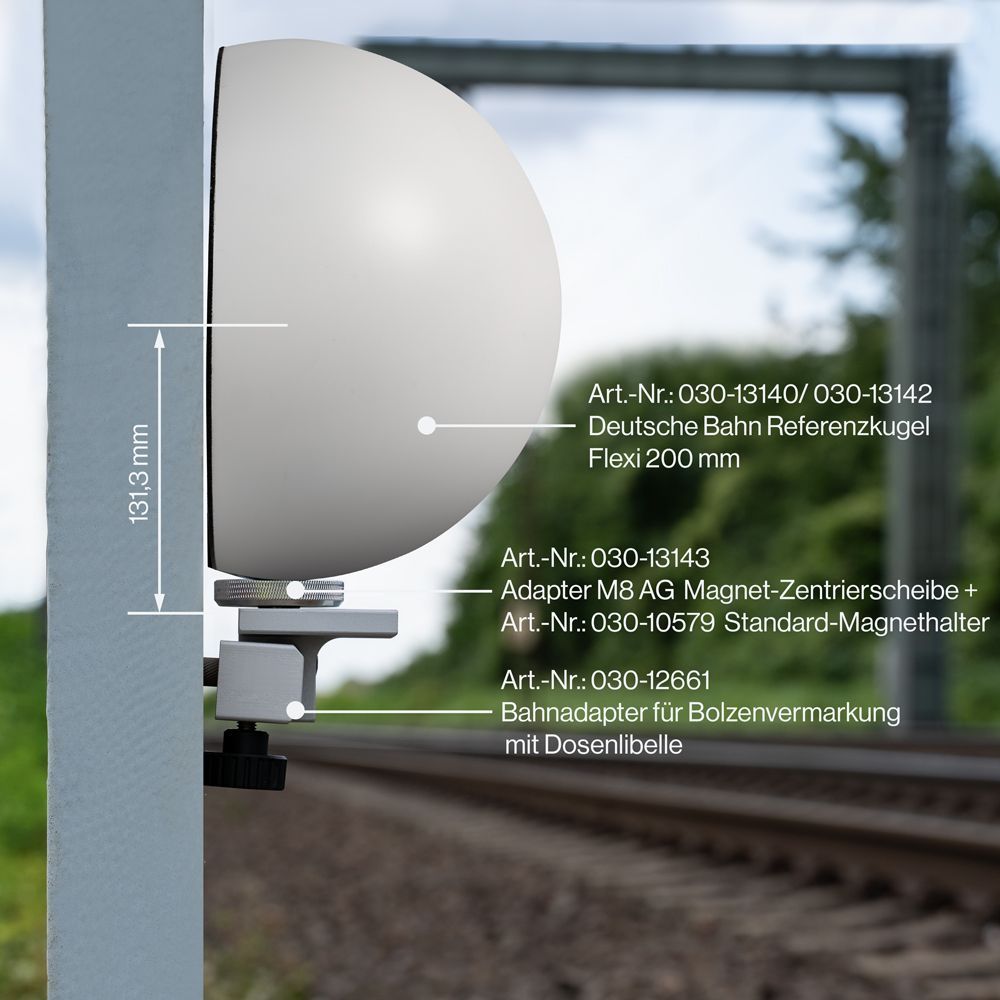 A white object is attached to a pole with measurements on it