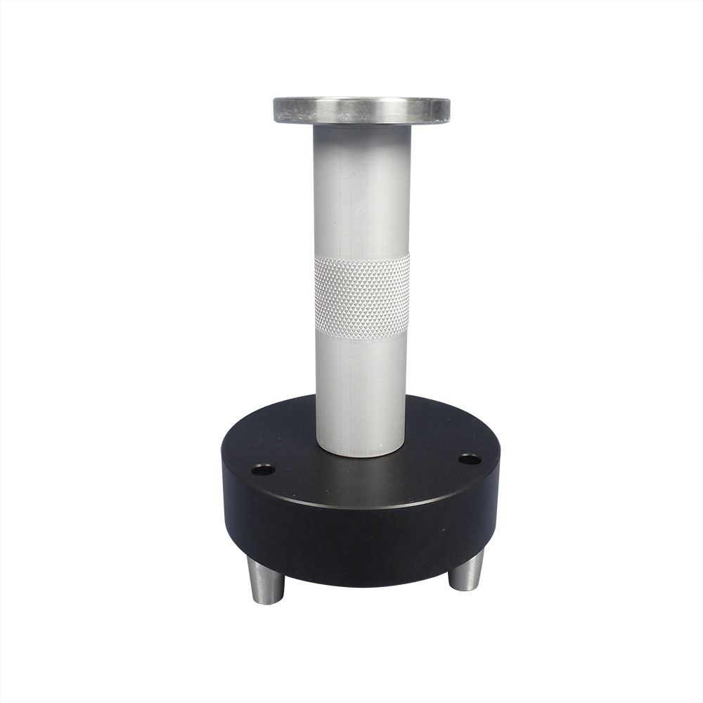 A person is holding a white ball in their hand