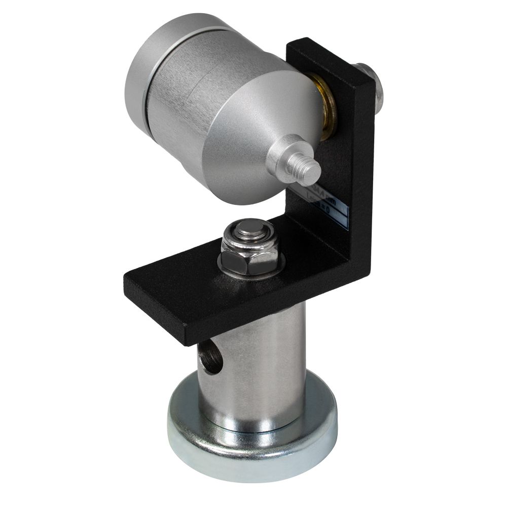 A small metal object with a label that says ' compass technology ' on it