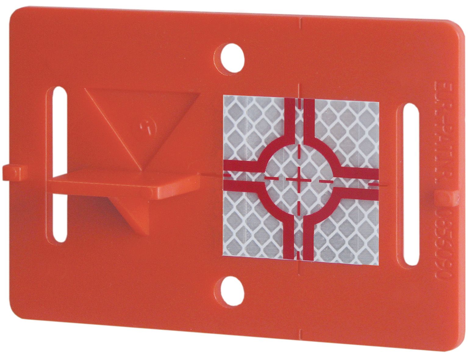 A red plastic object with a reflective square on it