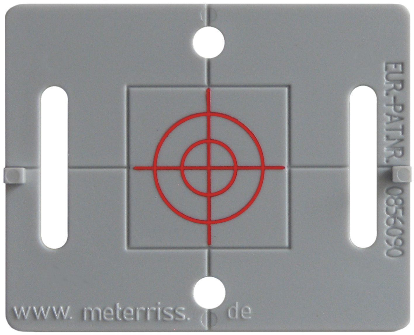 A red piece of plastic with a white target on it