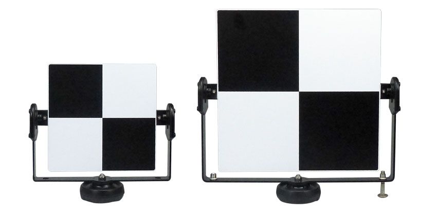 Two black and white squares are sitting next to each other on a white background.