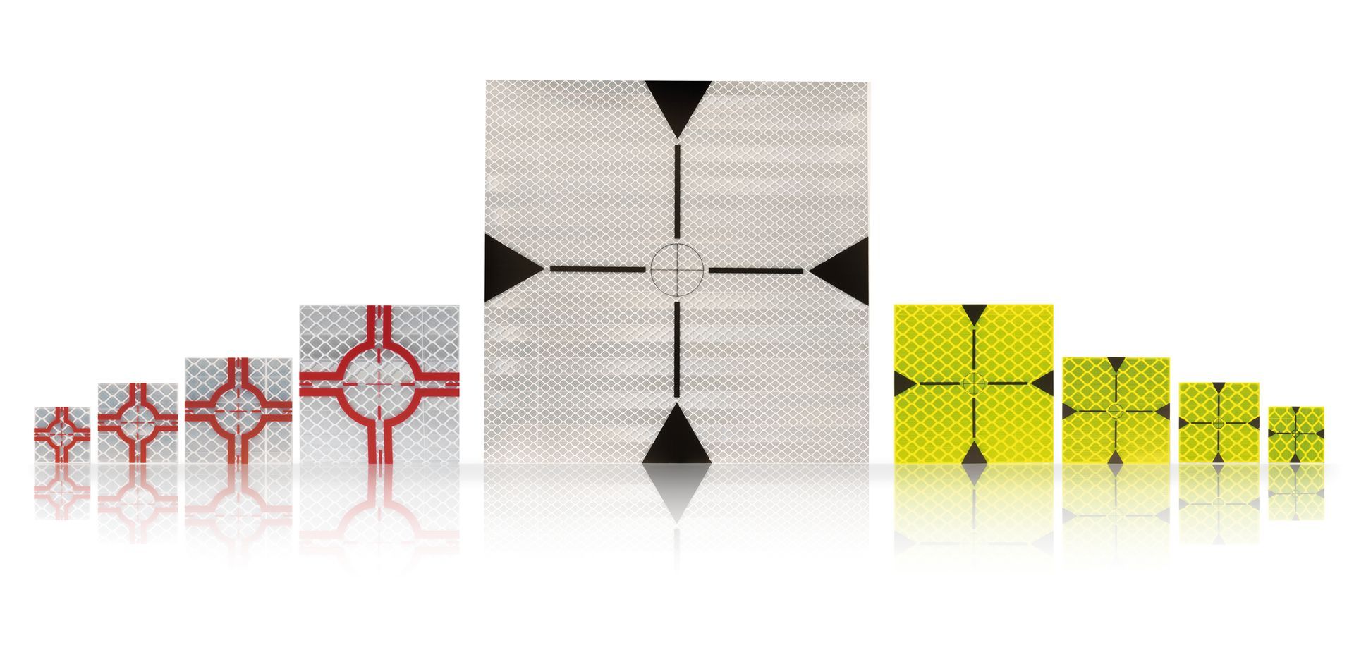 A white square with black triangles and a cross in the middle