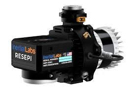 A close up of a black and white water pump on a white background.