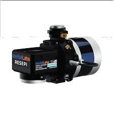 A close up of a camera on a white background.