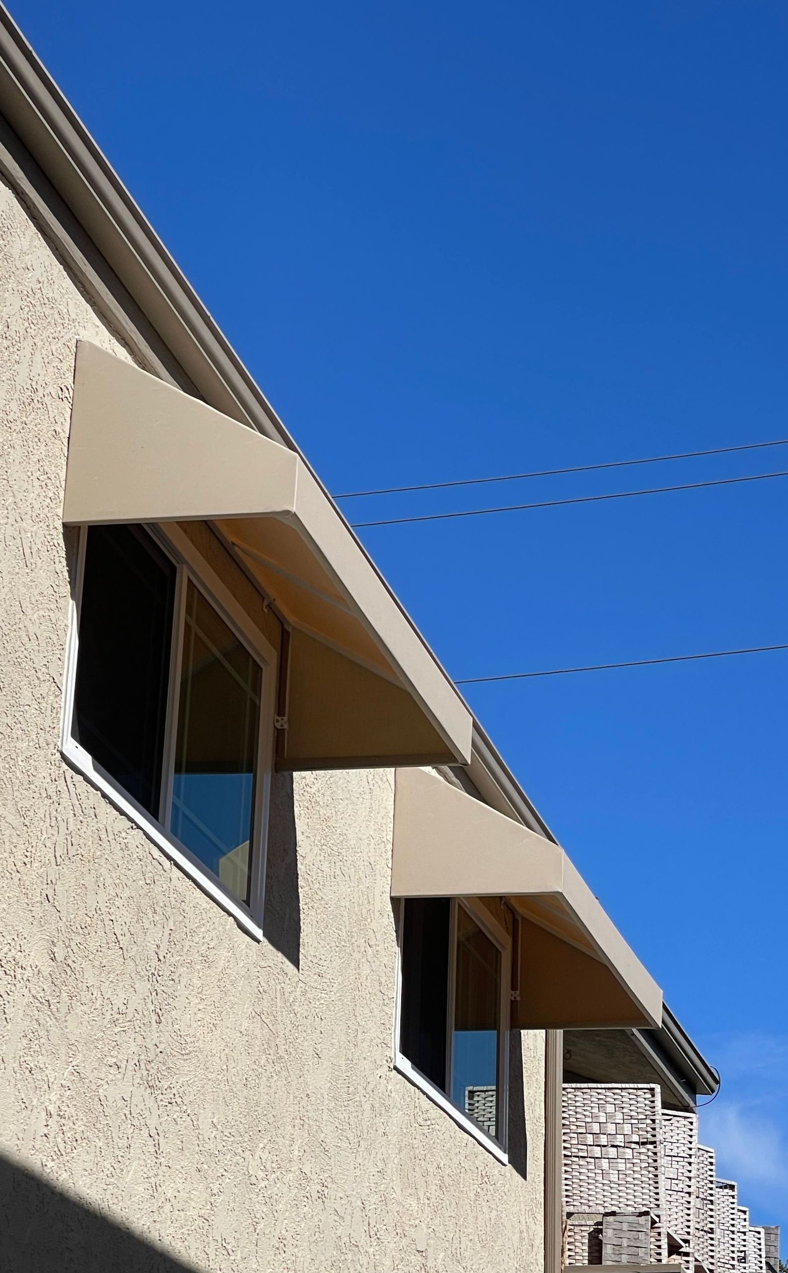A building with a awning on the side of it