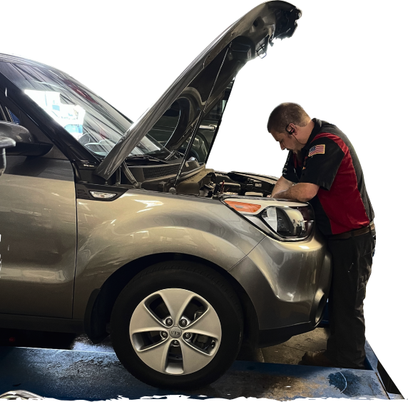 Mechanic Repairing Vehicle at Lava Auto Tire Service & Car Wash - Albany Auto Repair