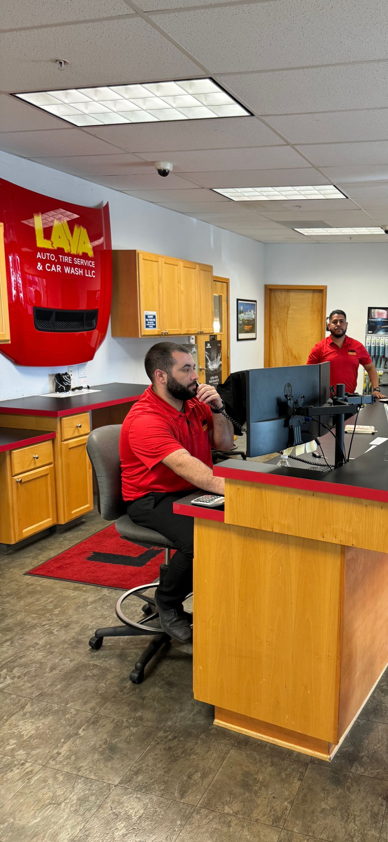 Service Advisor Talking with Client in Albany, OR - Lava Auto Tire Service & Car Wash