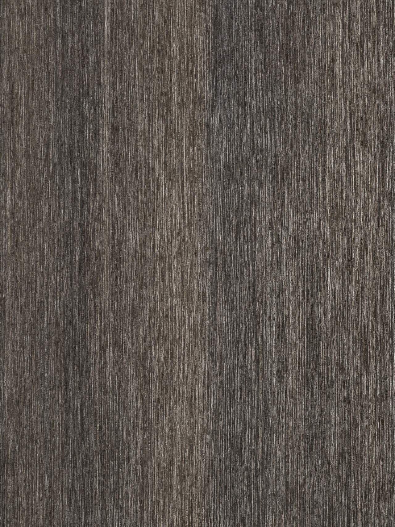 Un primo piano di un pezzo di legno che ne mostra la consistenza.