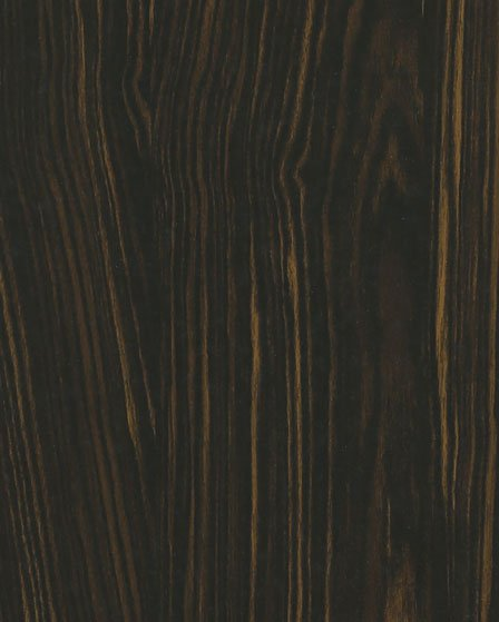 Un primo piano di un pezzo di legno scuro.