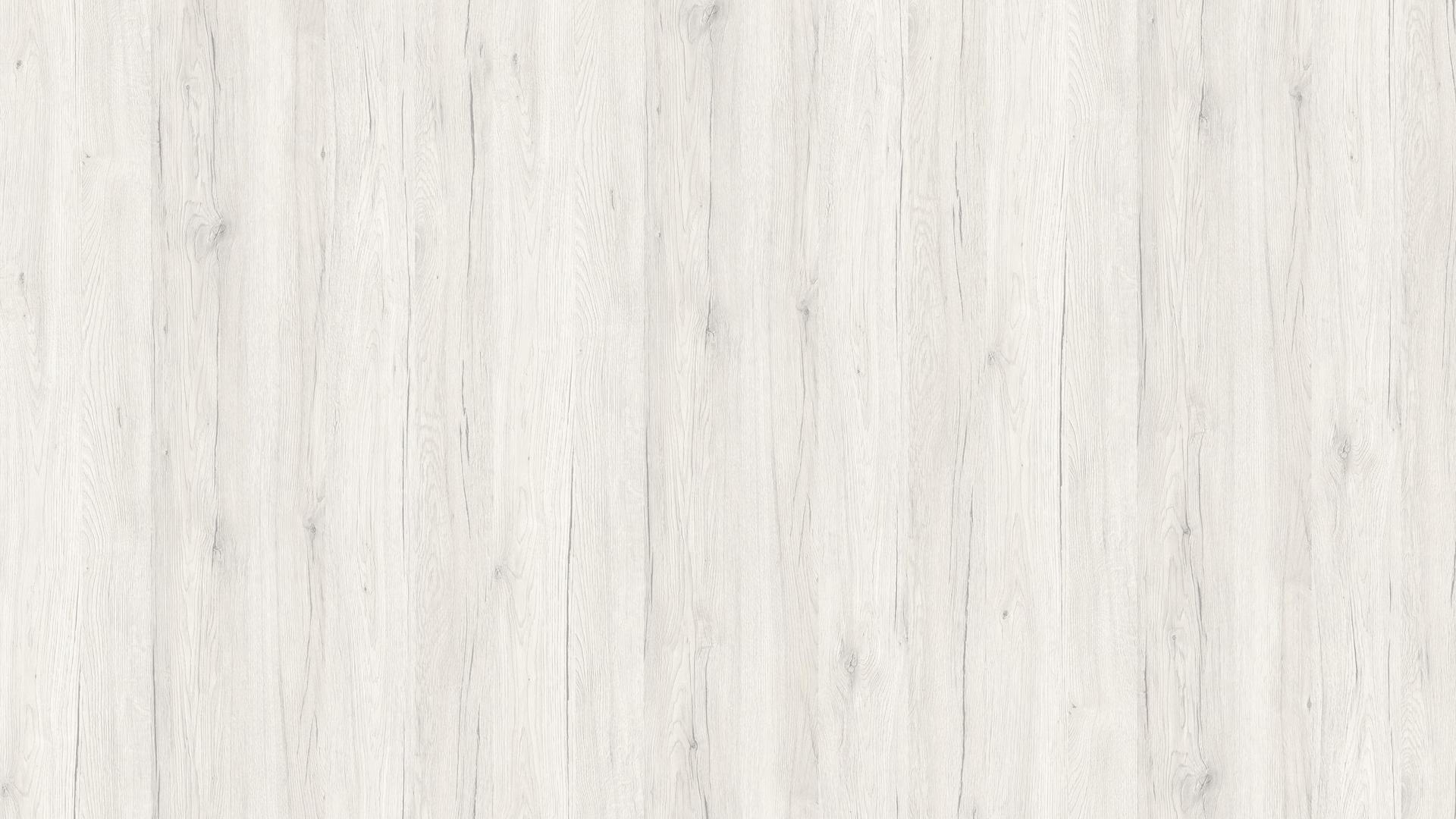 Un primo piano della trama della venatura del legno bianco.