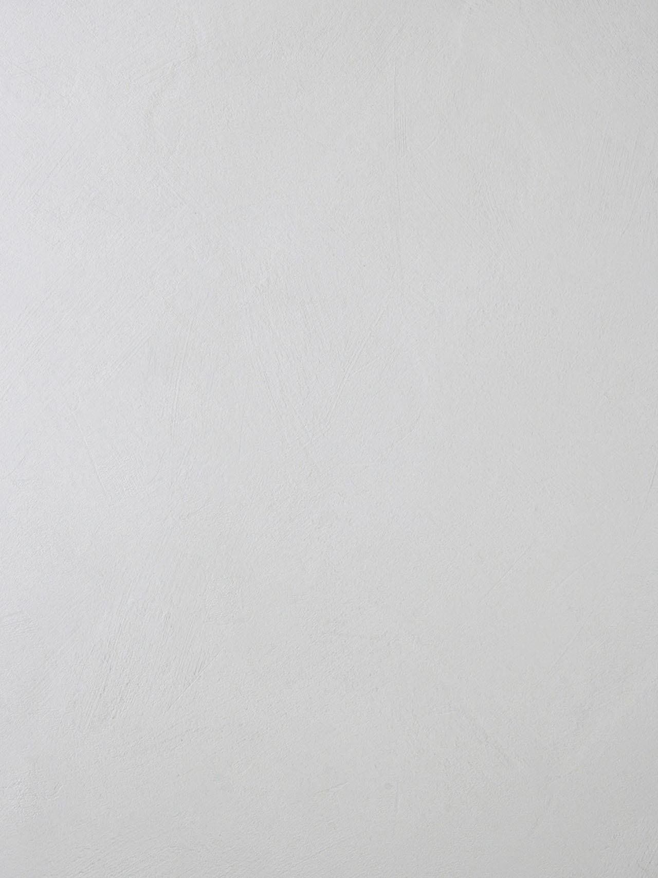 Un primo piano della trama di una carta bianca.