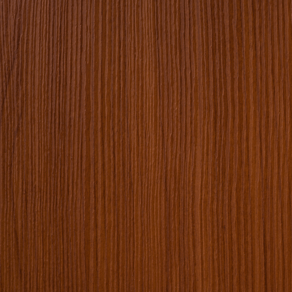 Un primo piano di un pezzo di legno che ne mostra la consistenza.