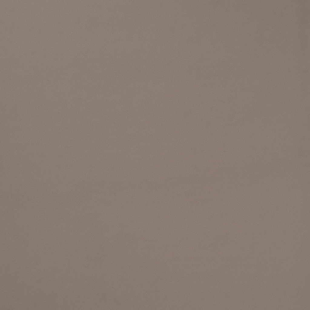 Un primo piano della trama di una carta marrone.